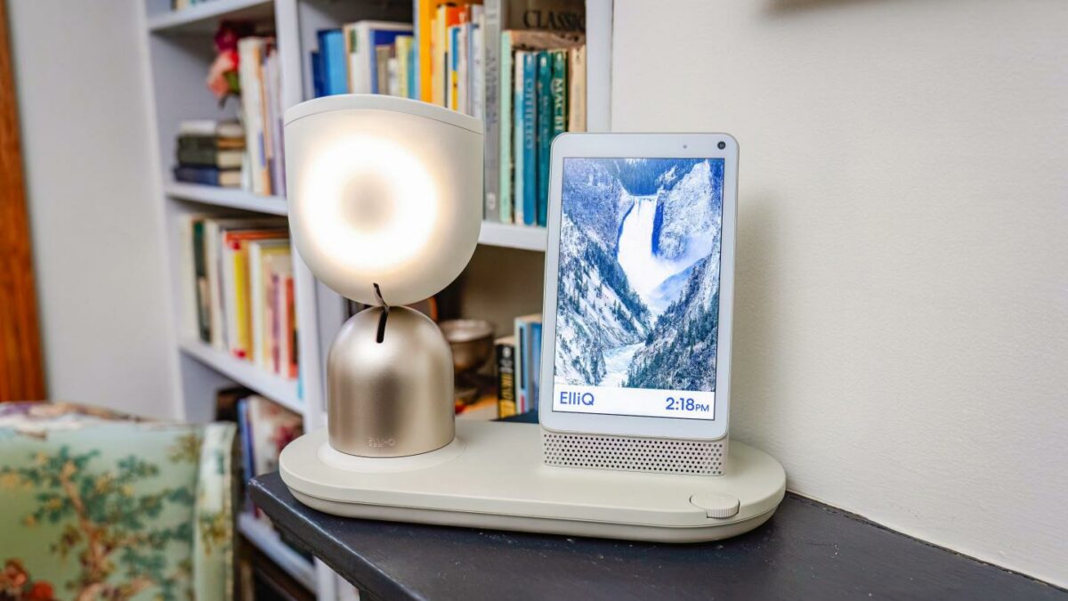 Photo of the ElliQ device in a living room