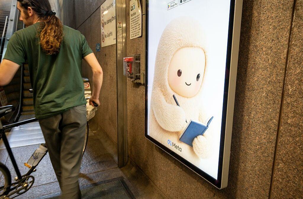 A person with a bicycle walks past advertisement for Meta Muse.